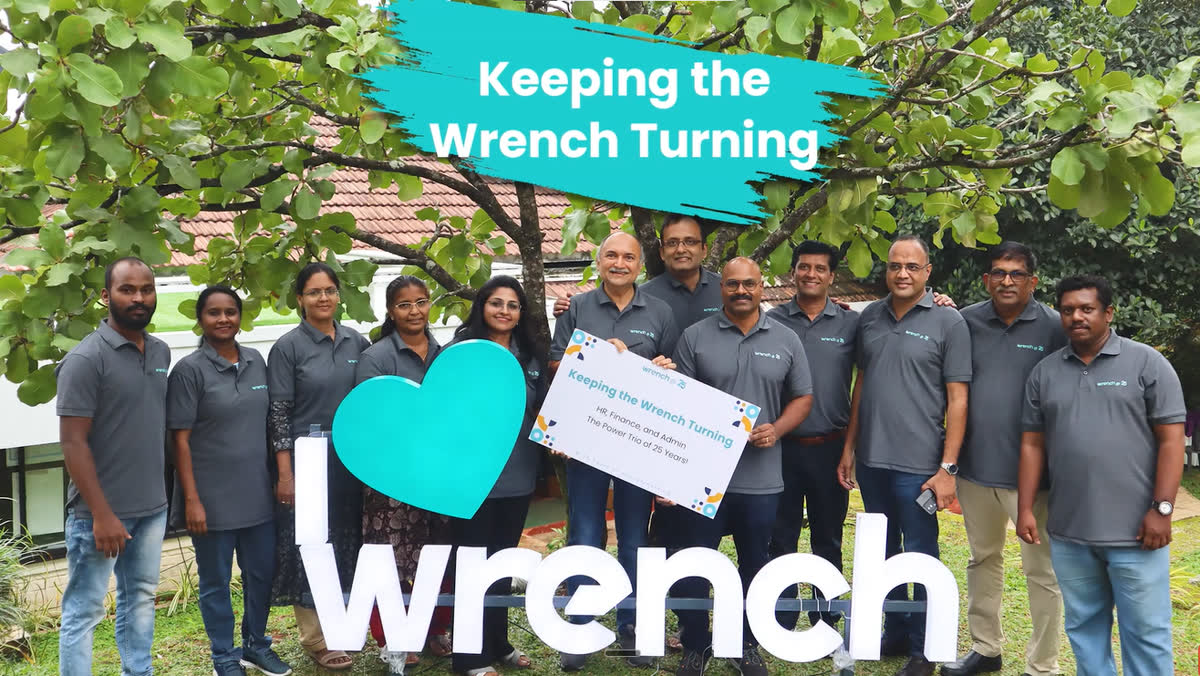 Team Keeping Wrench Turning